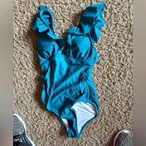 Flirty Ruffle Top Swimsuit with Cris Cross Back and Tummy Control